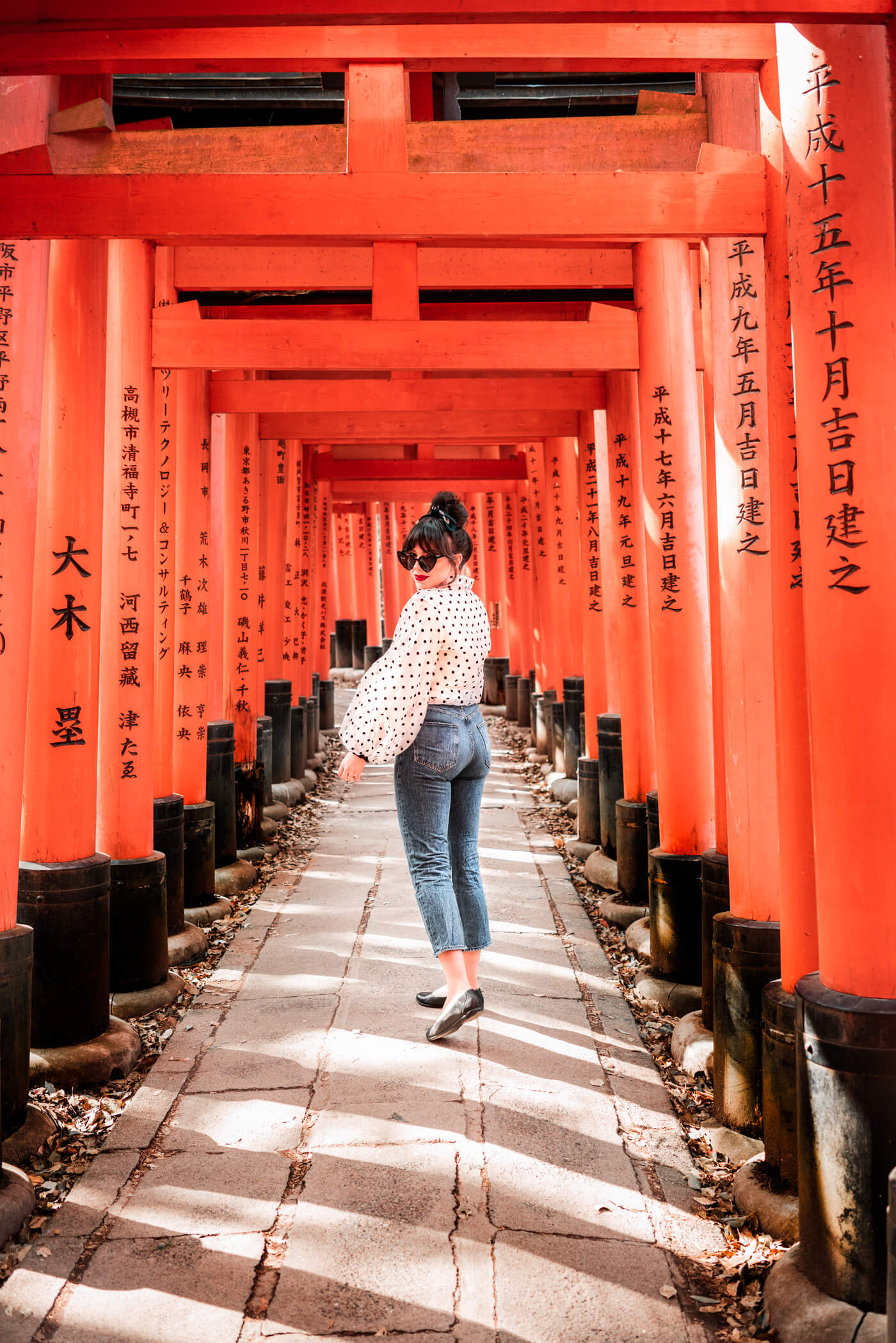 woman walking at the Fushimi Inari Shrine
