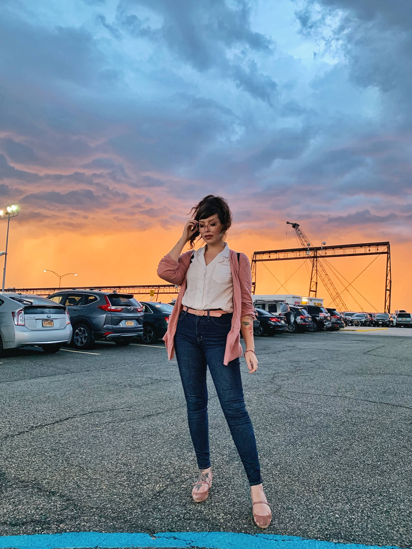 woman wearing shirt and denim jeans