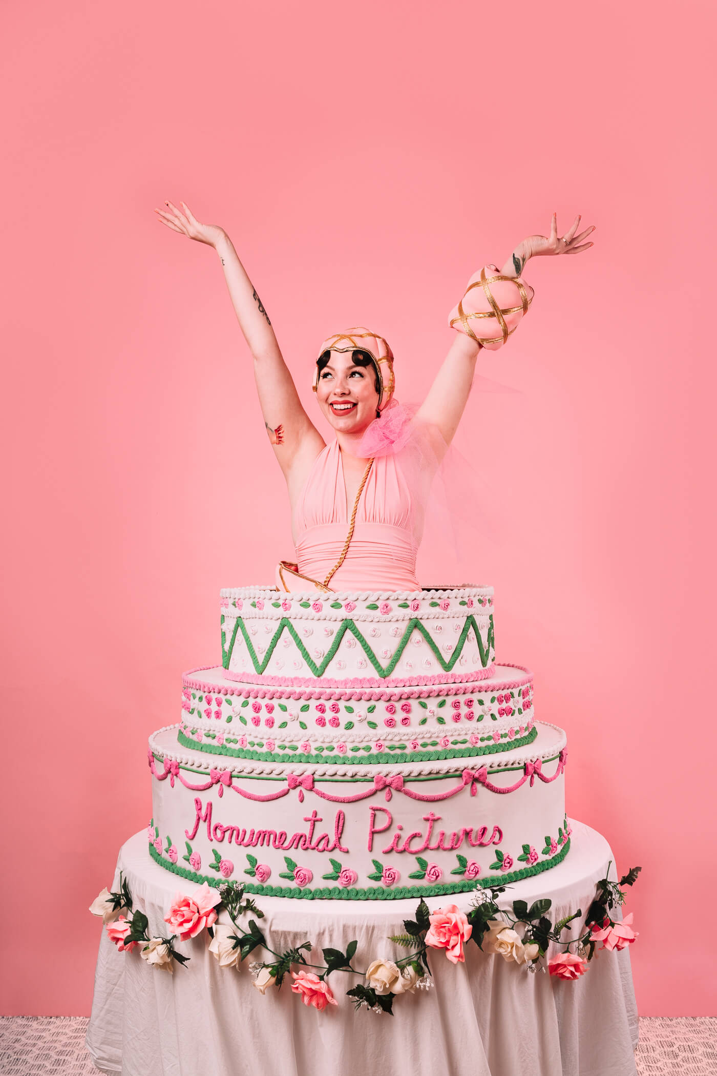 woman wearing a large cake as bottom for Singin' In The Rain Costume 