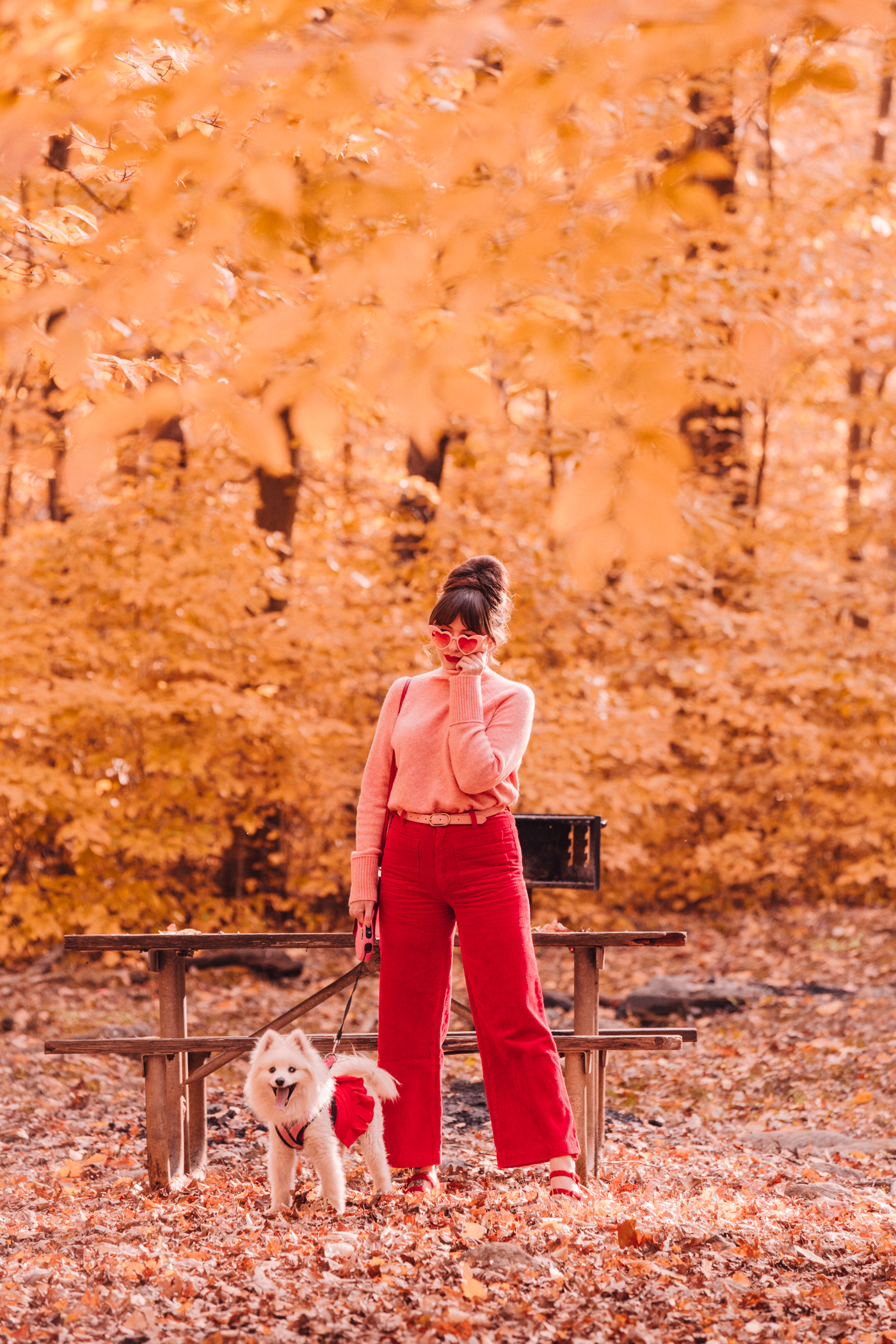 woman wearing pink and red in the outdoors