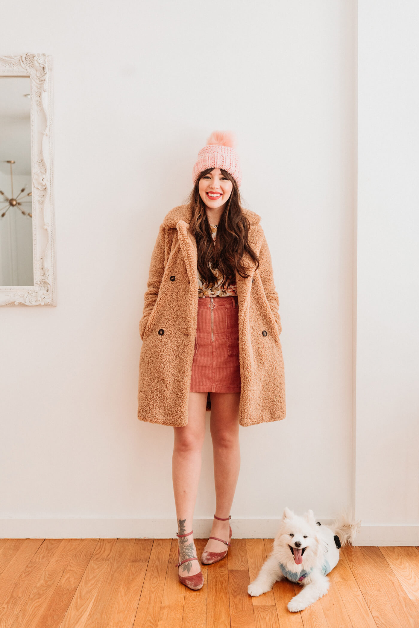 woman styling Teddy Coat with skirt and bonet