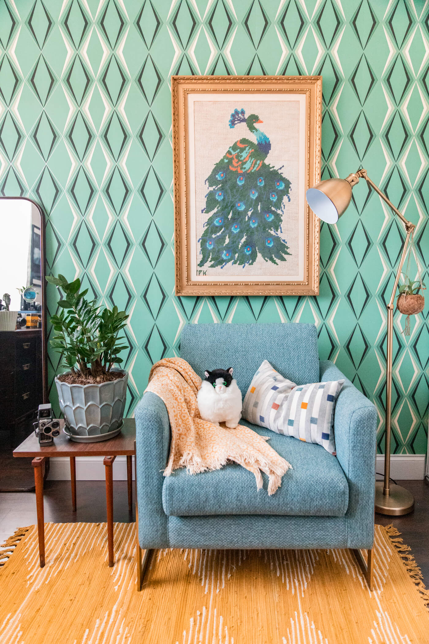 blue chair, plant, gold lamp, frame, and painted wall for HomeGoods Home Office Makeover