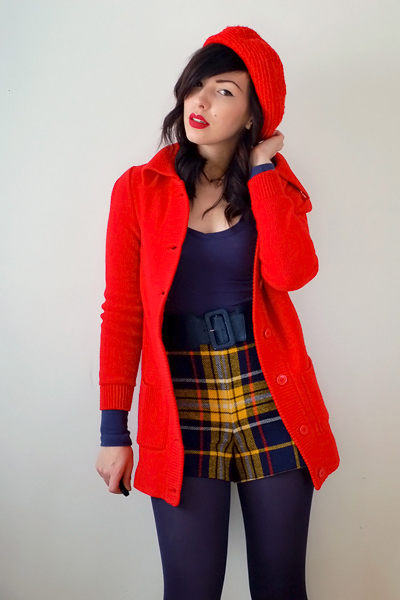 woman in red coat sharing her personal style 