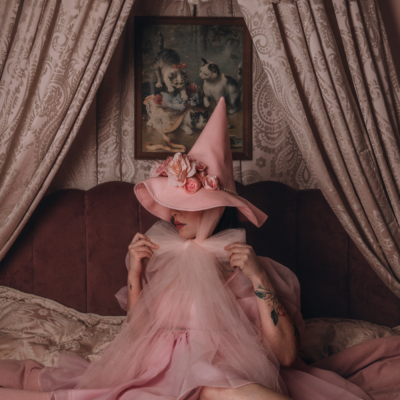 keiko lynn in a pink witch hat