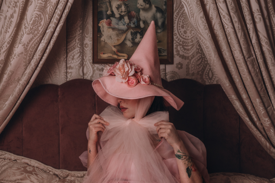 keiko lynn in a pink witch hat